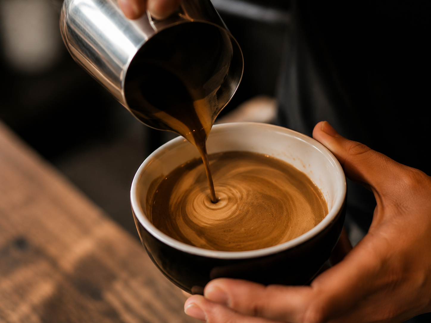 Coffee being poured into a cup